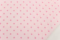 Бавовняна тканина з малиновими зірками 10 мм на світло-рожевому тлі 1618