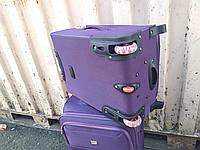 Чемодан малый на четыре колеса из плотной ткани 55 × 32 × 21+5 см 45 л Фиолетовый