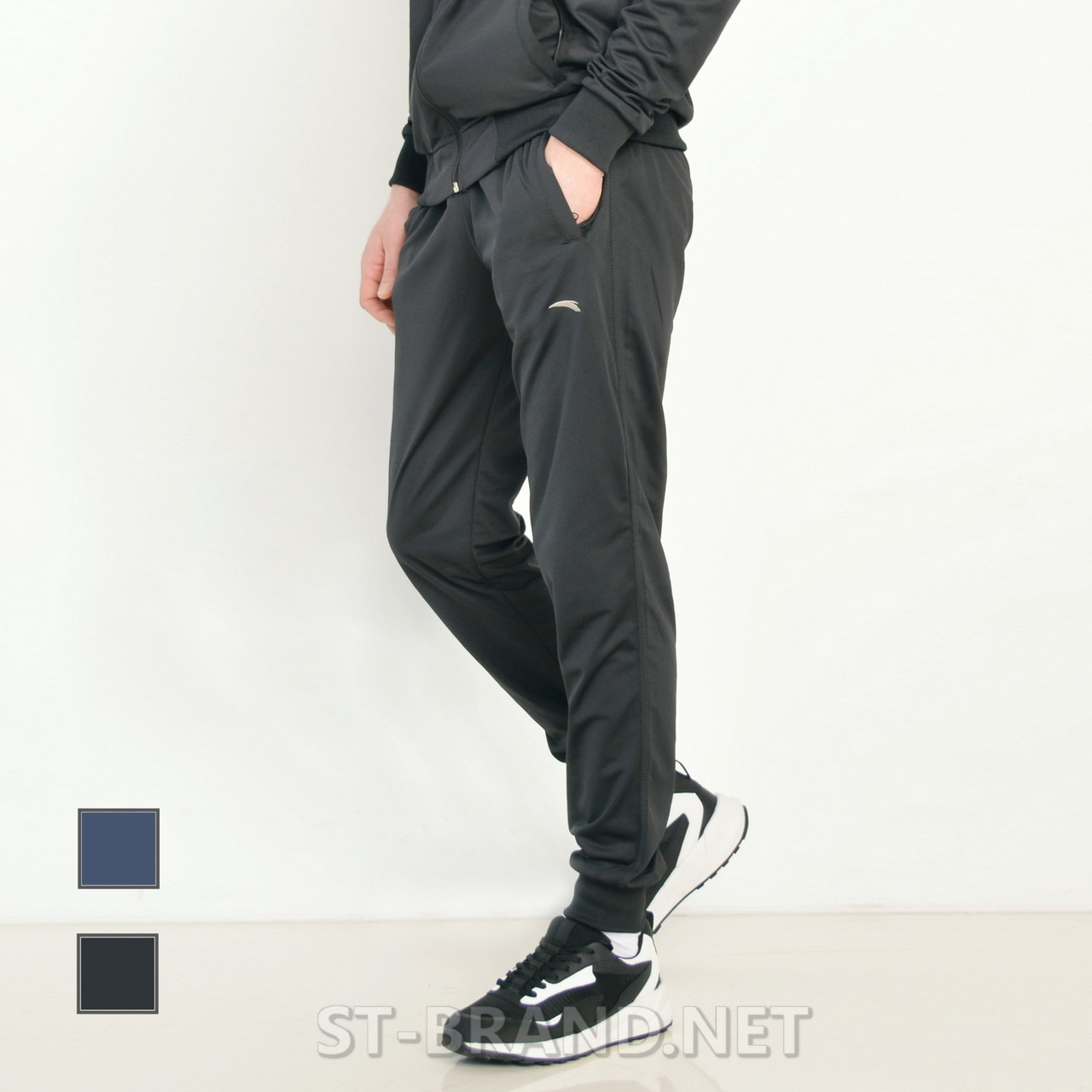М-2XL. Практичні та зносостійкі чоловічі спортивні штани на манжеті із трикотажу лакости - чорні