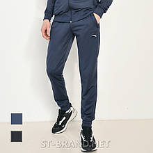 М,XL,2XL. Практичні та зносостійкі чоловічі спортивні штани на манжеті із трикотажу лакости - сині