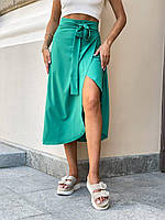 Легкая и нежная женская летняя однотонная зеленая юбка на запах из софта длины миди