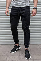 Черные спортивные брюки на манжетах