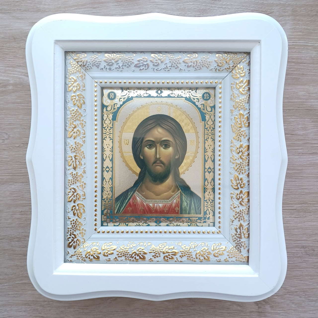 Ікона Спаситель, лик 10х12 см, у білому фігурному дерев'яному кіоті