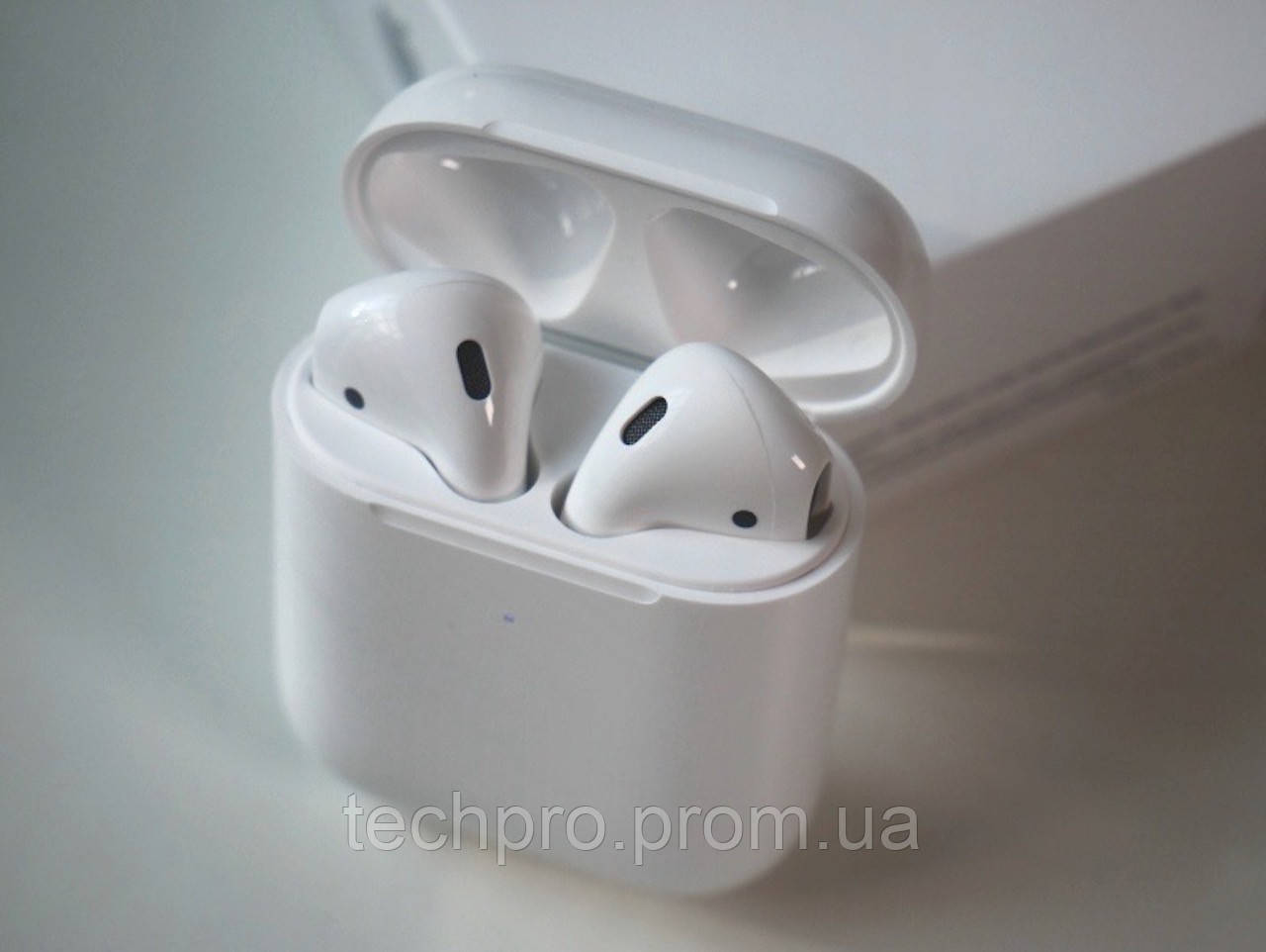 Наушники Apple AirPods 2 с беспроводной зарядкой - фото 1 - id-p1891173466