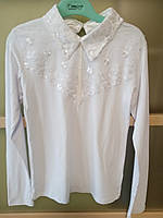 Блузка трикотажная белого цвета с кружевом