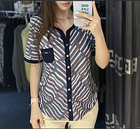 Стильная женская рубашка  на пуговицах с коротким рукавом и карманчиком с  48,50,56