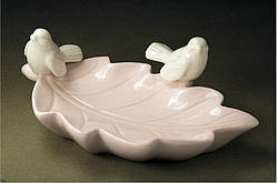 Біла кераміна статуетка-органайзер пташки на листку