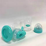 Молоковідсмоктувач механічний ручний вакуумний з пляшкою для зберігання молока для годуючих мам Next to Nature Lindo, фото 3