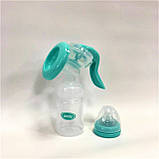 Молоковідсмоктувач механічний ручний вакуумний з пляшкою для зберігання молока для годуючих мам Next to Nature Lindo, фото 2