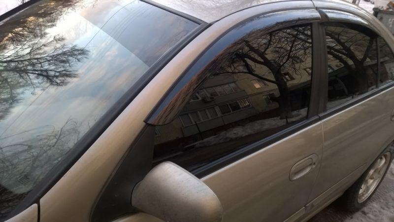 Дефлектори вікон (вітровики) Nissan Almera Classic N16 2000-2012 (AutoClover)