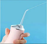 Іригатор портативний Oral Irrigator для чищення зубів 1500mah Рожевий S3J2-Pink, фото 4