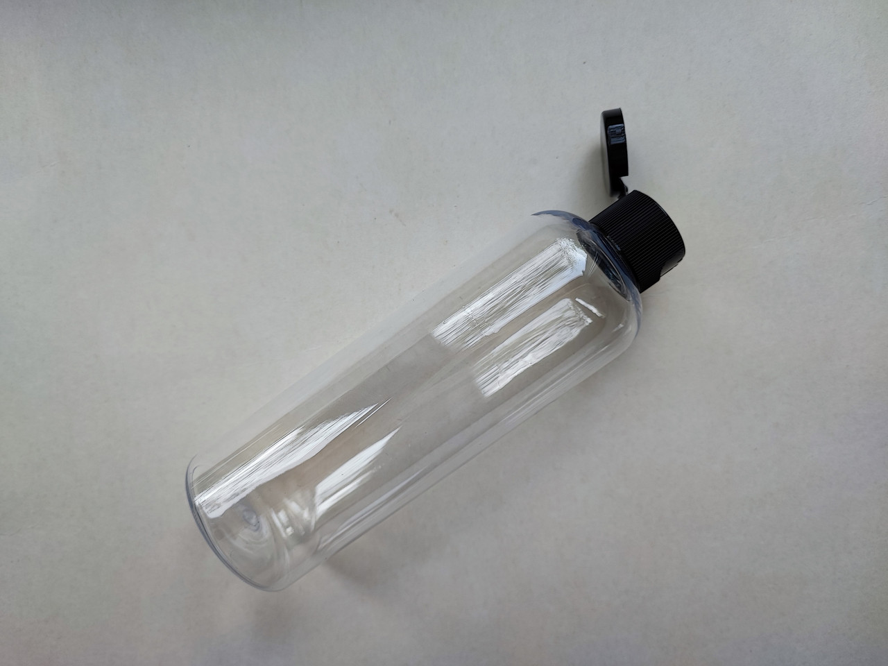 150мл/20мм Круглий прозорий з кришкою ЧОРНОЮ фліп-топ 20/410, ПЕТ пляшка флакон, пластиковий, пластмасовий