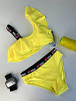Жовтий роздільний купальник для дівчинки топ з воланом і високі плавки класичного крою р. 38-42