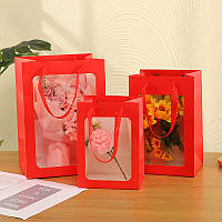 Подарунковий пакет із віконцем червоний 15х20х10 см