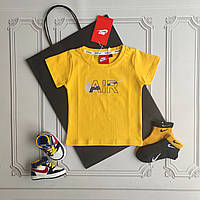 Жовта футболка Nike для новонародженого