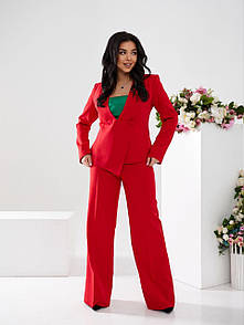Жіночий червоний діловий костюм з асиметричного піджака та штанів