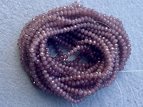 Кришталеві намистини 3*3,5мм, грановані - фіолетовий