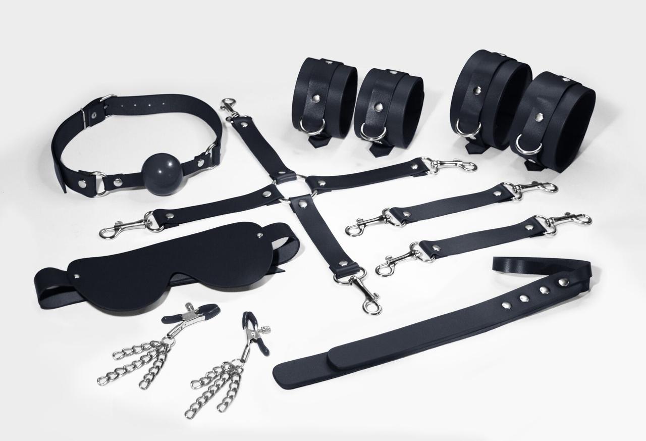 Набір Feral Feelings BDSM Kit 7 Black, наручники, поножи, конектор, маска, паддл, кляп, затискачі