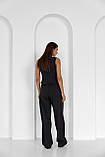 Костюм жіночий жилетка + штани палацо чорного кольору, фото 7