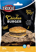 Лакомство Trixie для собак "Chucekn Burger" Бургер с курицей и сыромятной кожей 9см 140г