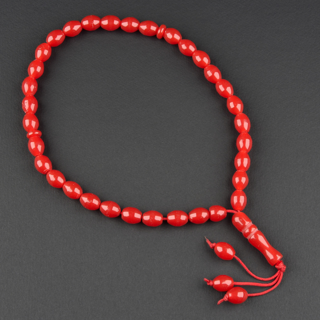 Чітки пластикові з червоними намистинами та висувкою кількість намистин 33 штуки довжина 70 см - фото 1 - id-p1904355588