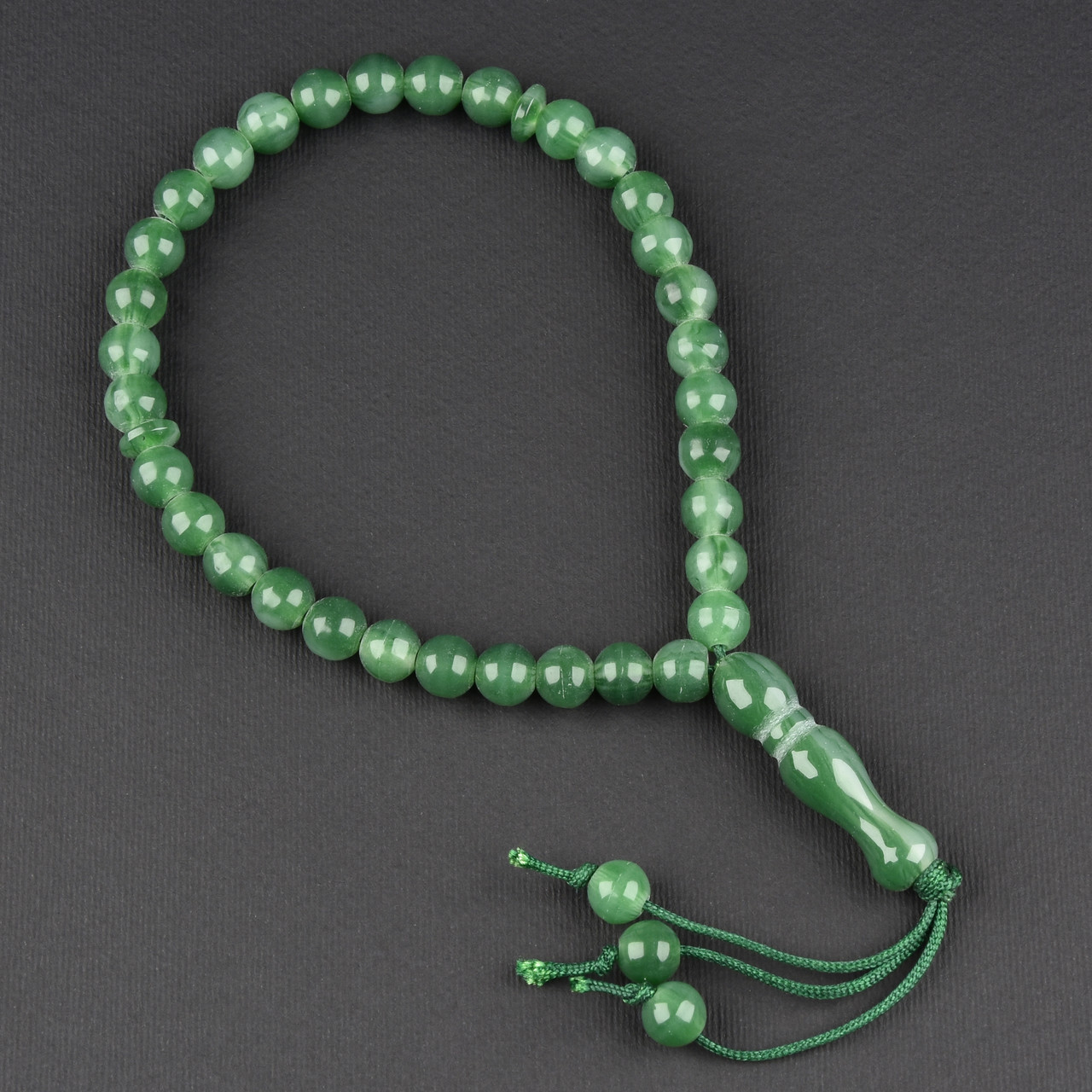 Чітки пластикові із зеленими намистинами та висувною кількістю намистин 33 штуки довжина 70 см - фото 1 - id-p1904370767