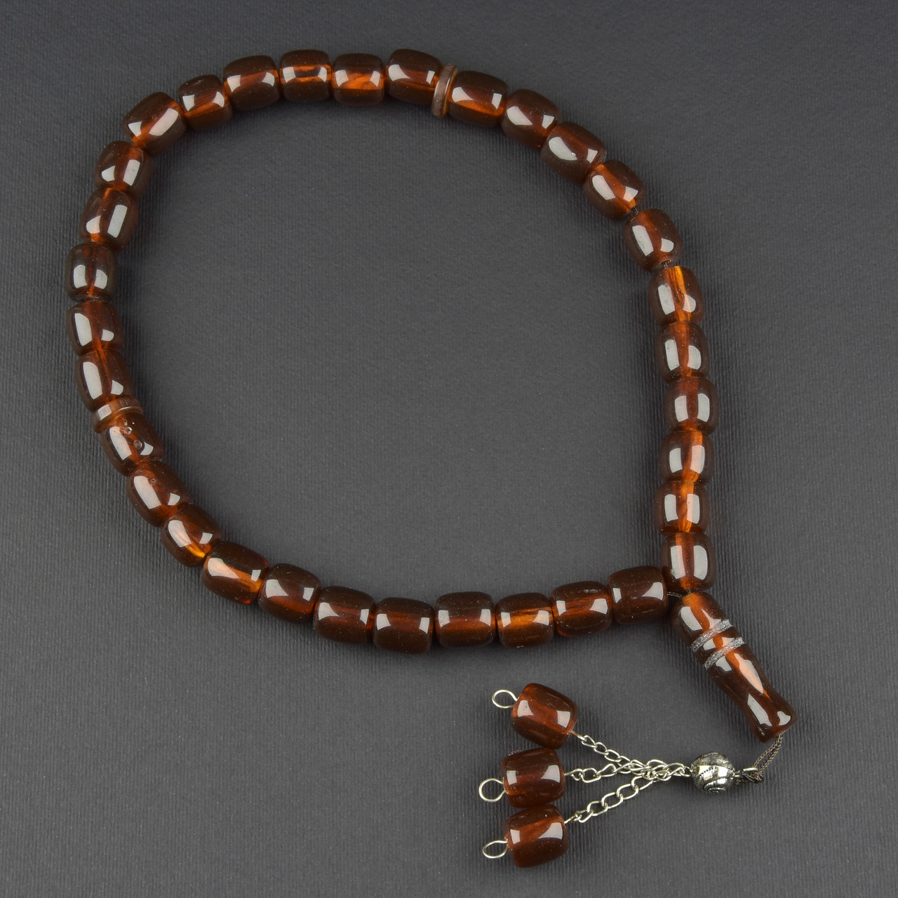 Чітки пластикові з великими коричневими намистинами та висувною кількістю намистин 33 штуки довжина 70 см - фото 1 - id-p1904396783