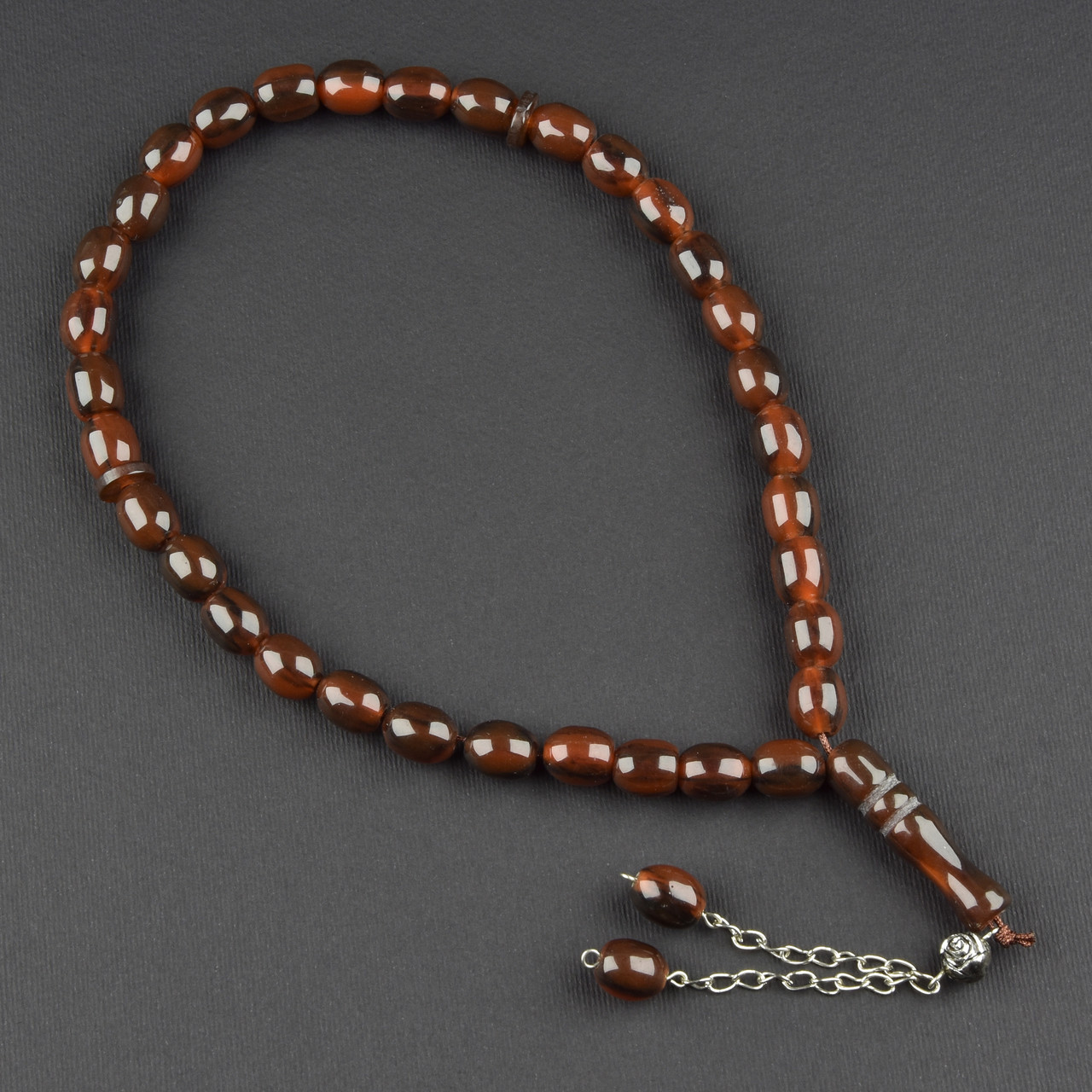 Чітки пластикові з коричневими намистинами та висувкою кількість намистин 33 штуки довжина 70 см - фото 1 - id-p1904435626