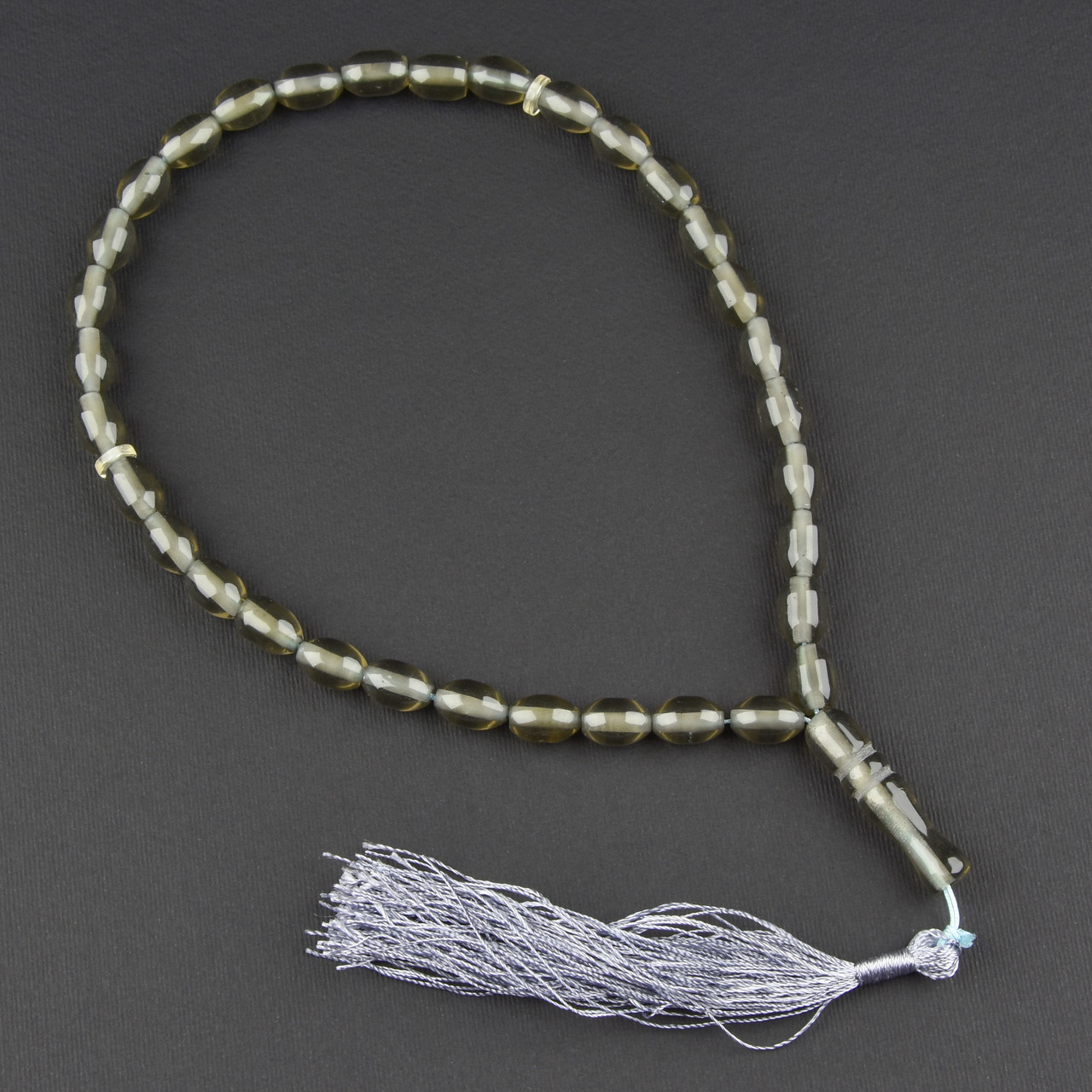 Чітки пластикові із сірими напівпрозорими намистинами та висулькою кількість намистин 33 штуки довжина 70 см - фото 1 - id-p1904439084