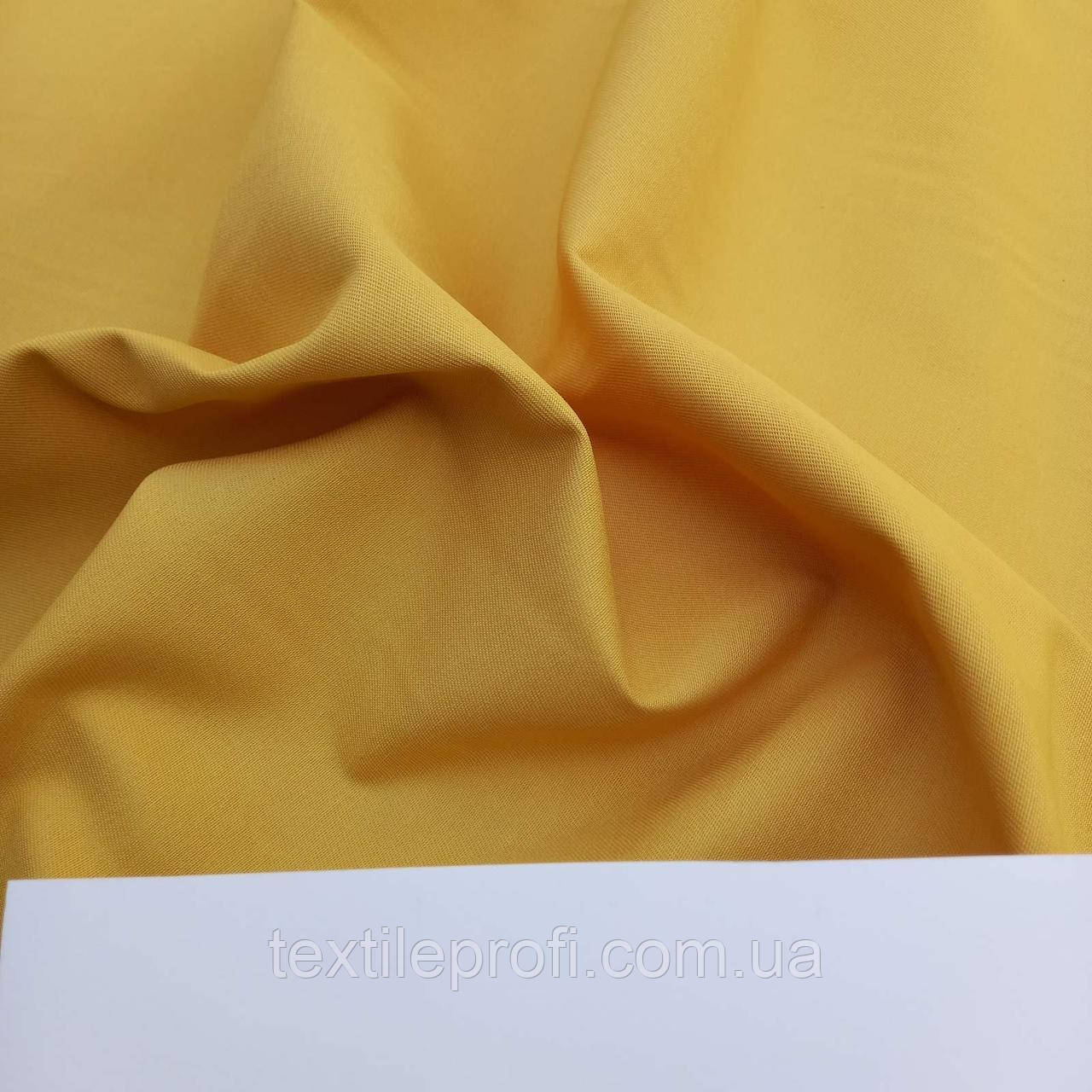 Габардин з водонепроникним покриттям жовтого кольору (шир. 180 см)