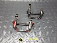 Скоба переднего левого, правого суппорта B26C33281 на Mazda 323 BJ, 323F 1998-2004 год