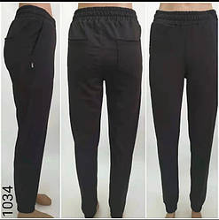 Штани жіночі повсякденні з кишенями позаду та манжетами рр рр S, M, L, XL норма чорного кольору