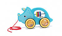 Каталка на шнурку з рахунками та брязкальцем 20 см OKKID дитяча розвиваюча іграшка у вигляді носорога