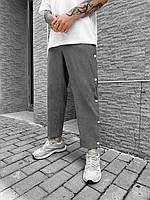 Мужские стильные классические брюки серого цвета cвободного кроя с внутренним узором