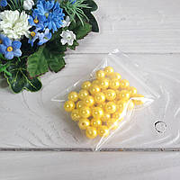 Перли насичені жовтим штучним. 8 мм. Вага 20 грамів