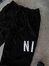 Спортивні штани чоловічі чорні осінь-весна однотонні оверсайз фірмові Nike (Найк), фото 2