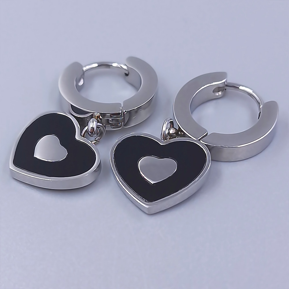 Сережки Stainless Steel. Сталь. Родій. Довжина: 27 мм. Ширина: 13 мм.