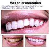 Відбілююча зубна паста Jaysuing v34 50мл. Мус для видалення жовтизни зубів. Фіолетова зубна паста, фото 9