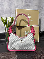 Красивая женская сумка в стиле Michael Kors розовая
