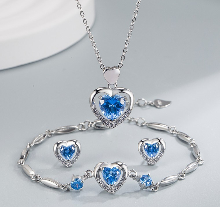 Набір ювелірної біжутерії Liresmina Jewelry Вічне серце океану - сережки, браслет, кулон сріблястий