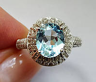 Серебряное кольцо с натуральным африканским Sky Blue топазом 3.35ct (10х8мм) и фианитами