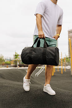 Спортивна сумка кругла тканинна чорна для спорту дорожня