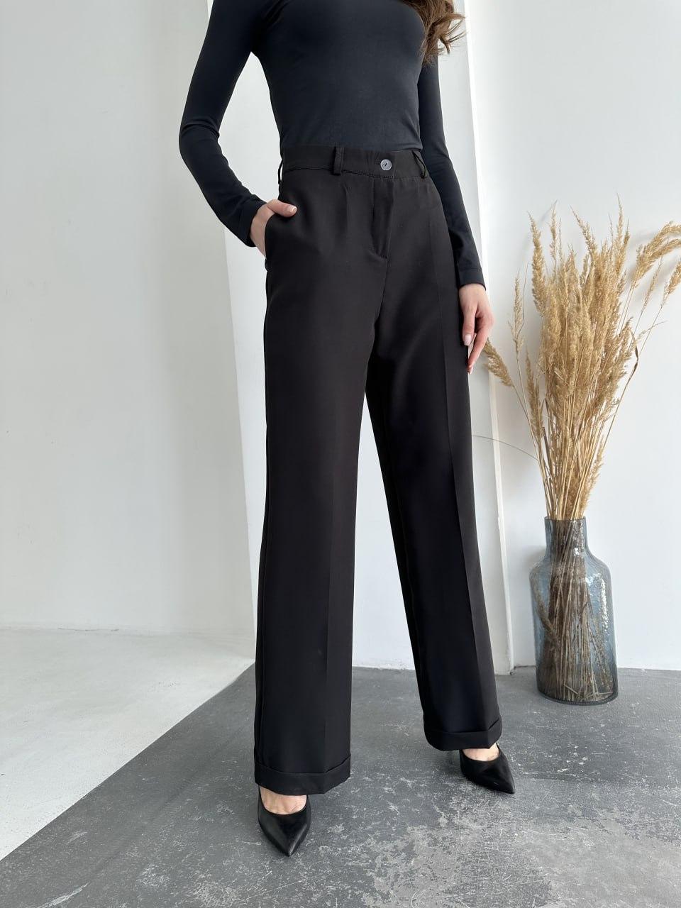 Стильные женские брюки палаццо с широкими штанинами черного цвета классические штаны на высокой посадке - фото 1 - id-p1911425143
