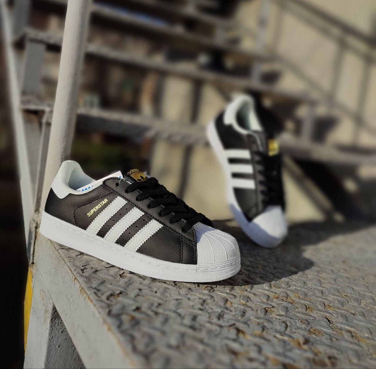 Adidas superstar black white hotsell 39