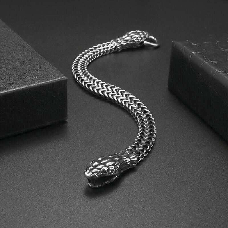 Красивый стальной браслет в виде змеи, браслет змея держит в пасти стальной круг - фото 5 - id-p1912005451