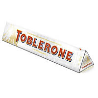 Шоколад Toblerone White Chocolate With Honey And Almond Nougat 100g