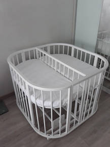 Овальне дитяче ліжечко-трансформер для двійнят, близнюків, погодків