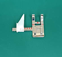 Лапка притискна з регульованою напрямною.