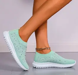 Жіночі кросівки