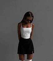 Черная мини юбка с разрезом XS/S из костюмки